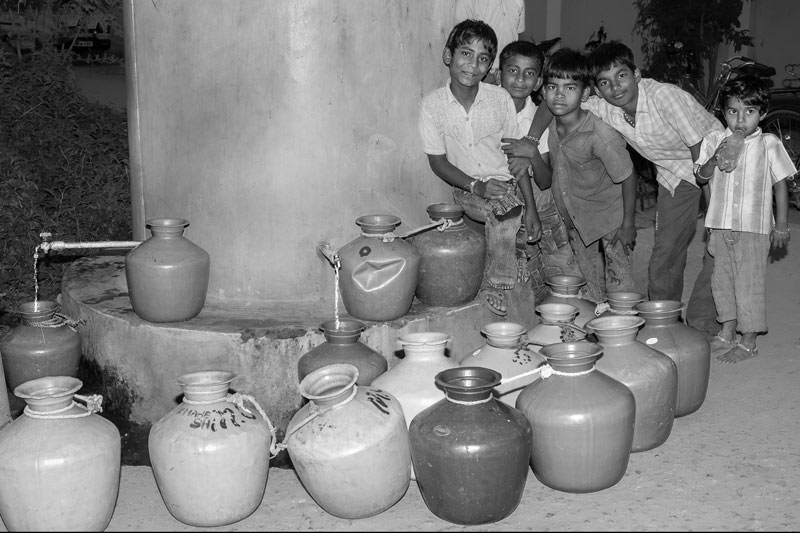 Impediments to enjoyment of Human Right to Water: 'Quality' Norm - Little potable water but many seekers in a colony in Anantapur town, Andhra Pradesh